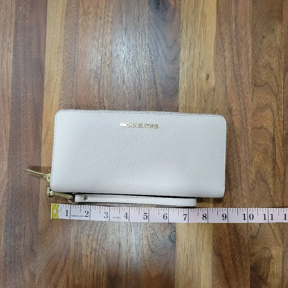 Michael Kors Jet Set Continental Wristlet in Pebbled Leather